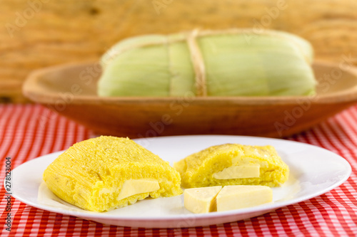 Pamonha, Brazilian sweet corn with cheese filling. Pamonha typical of Brazil, food of the state of minas gerais and goiais. Concept of traditional food. Brazilian food