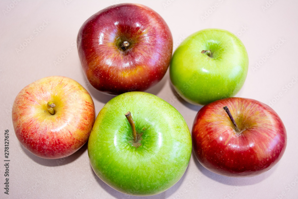 Red and green apples of different shades from above Red and green apples of different shades from above