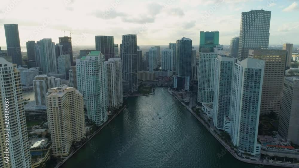 Aerial View Port of Miami and Down Town Brickell Showing Cruise Ships buildings Convention Centers and Arenas beaches Marinas, Rivers Miami Circle National Historic Landmark on a Sunny Afternoon Aerial View Port of Miami and Down Town Brickell Showing Cruise Ships buildings Convention Centers and Arenas beaches Marinas, Rivers Miami Circle National Historic Landmark on a Sunny Afternoon