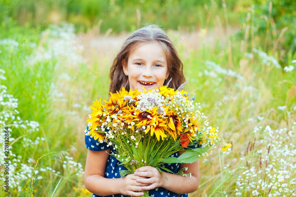 Little adorable girl gathered a bouquet of wild flowers Little adorable girl gathered a bouquet of wild flowers
