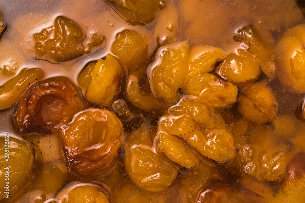 Background of apricots cooked in sugar syrup. Background of apricots cooked in sugar syrup.