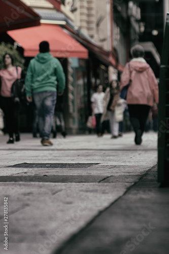Walking people out of focus
