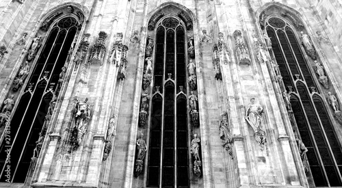 Gothic Arch Stained Glass Window on the Side of the Duomo di Milan in Milan Italy