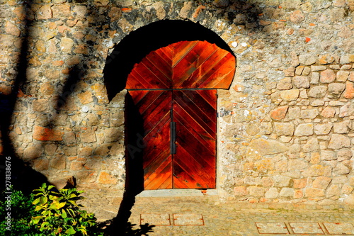Cool Arched Wooden Door in A Medieval Castle Wall