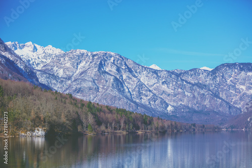 Fototapeta Naklejka Na Ścianę i Meble -  Mountain lake on a sunny day. Lake Bohinj (Bohinjsko jezero), Slovenia, Europe