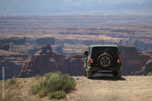 Off Road Vehicle at Shafer Trail Overlook - Canyonlands National Park, Utah