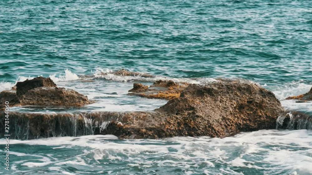 Turkish seacoast with cliffs and stones on a sunny day in summer in slo-mo Turkish seacoast with cliffs and stones on a sunny day in summer in slo-mo