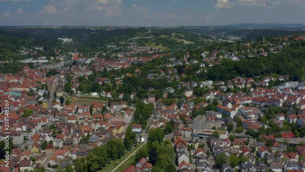 Aerial of the old part of town of Schwäbisch Gmünd in Germany. Camera tilts down and slowly rotates left over the city, panorama view. Aerial of the old part of town of Schwäbisch Gmünd in Germany. Camera tilts down and slowly rotates left over the city, panorama view.