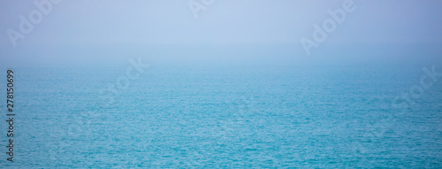 Expanse of water on the sea with a foggy horizon