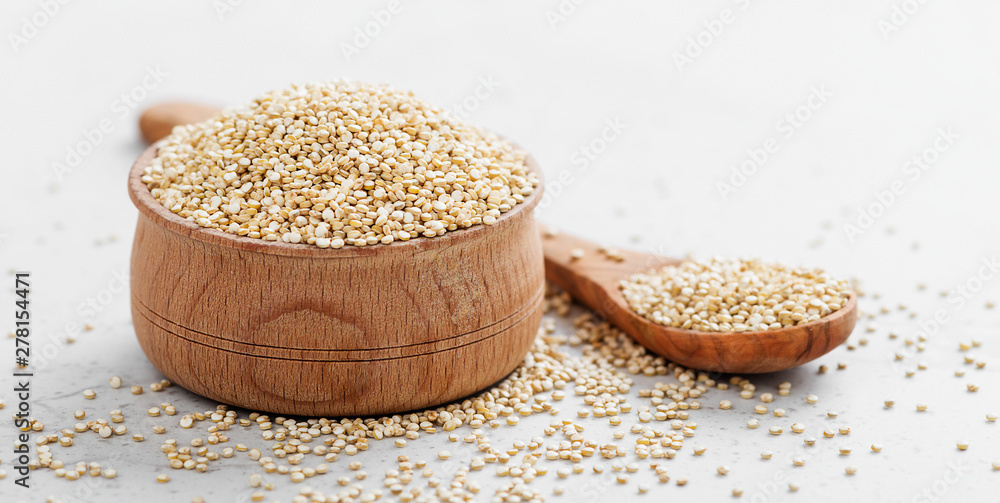 Bowl of healthy white quinoa seeds. Bowl of healthy white quinoa seeds.