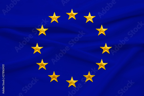 stylized European Union flag, symbol of united Europe on soft silk with soft folds, close-up