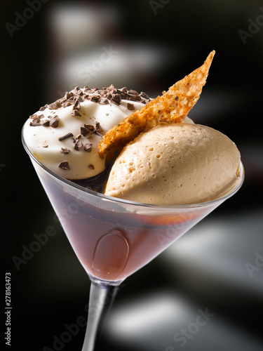 dulces, copa de helado de almendrara con ron. sweets, glass of almond ice cream with rum.
