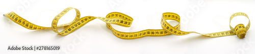 horizontal photograph of a tailor centimeter on a completely white background