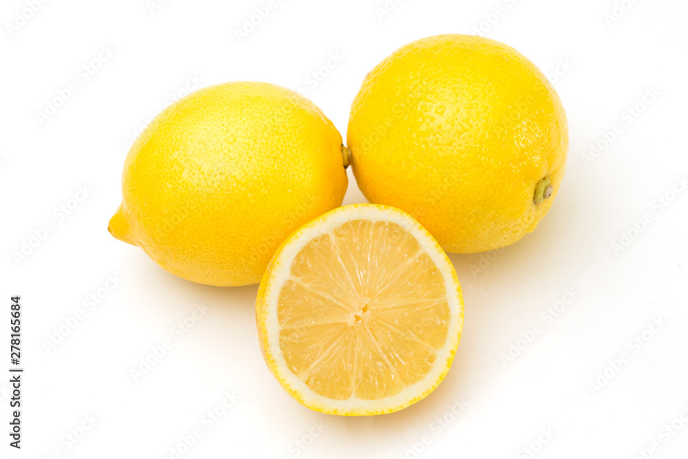 Juicy lemons on a completely white background. Fruits and vitamins.