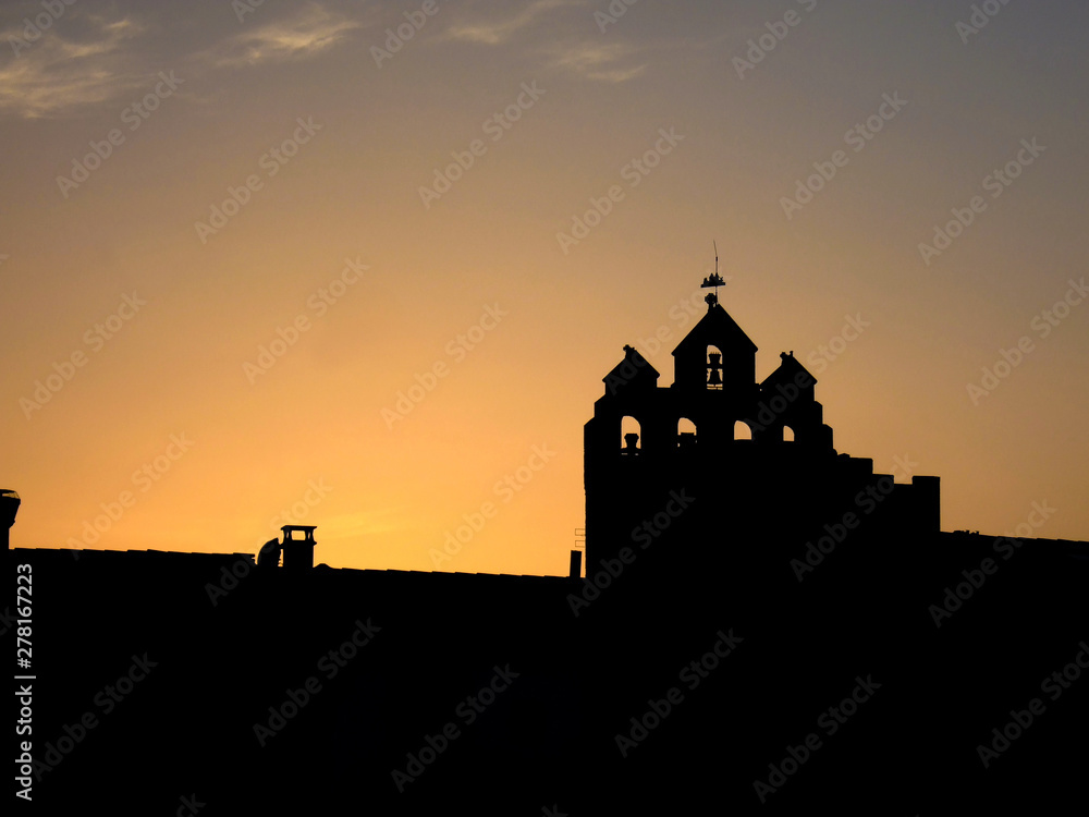 Church of Saintes-Maries-de-la-Mer in france at sunset