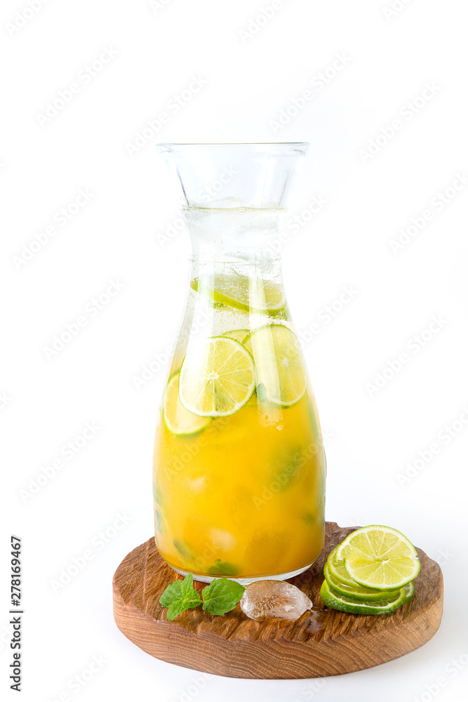 Natural orange lemonade with citrus and mint on white background. Detox drink for a healthy lifestyle. Natural orange lemonade with citrus and mint on white background. Detox drink for a healthy lifestyle.
