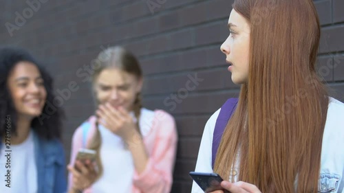 Teen girl upset by shameful video in internet, classmates mocking, cyberbullying