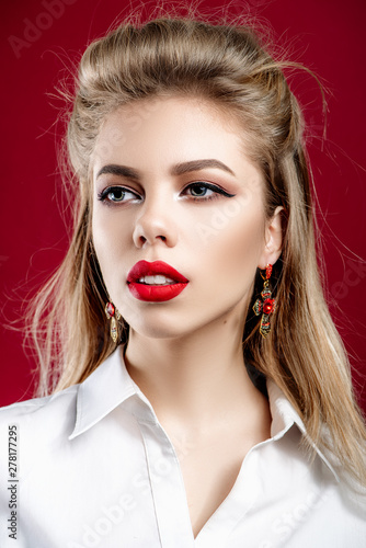 Sexy  young  beautiful blonde with make-up. Beauty portrait