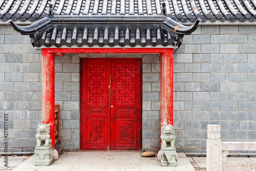 red chinese door to temple