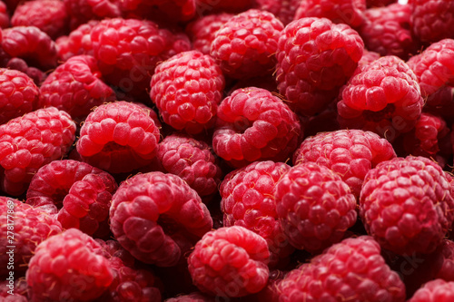 Delicious fresh ripe raspberries as background, closeup