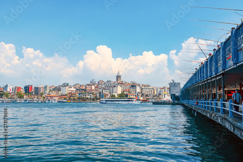 05/25/2019 Istambul, many fishermen and tourists are on the Galata Bridge through the Bosphorus Strait. It is a famous landmark in the historic center of Istanbul. tourist image as a postcard. photo