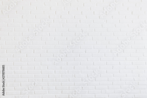 Modern Clear white brick tiles wall texture background.