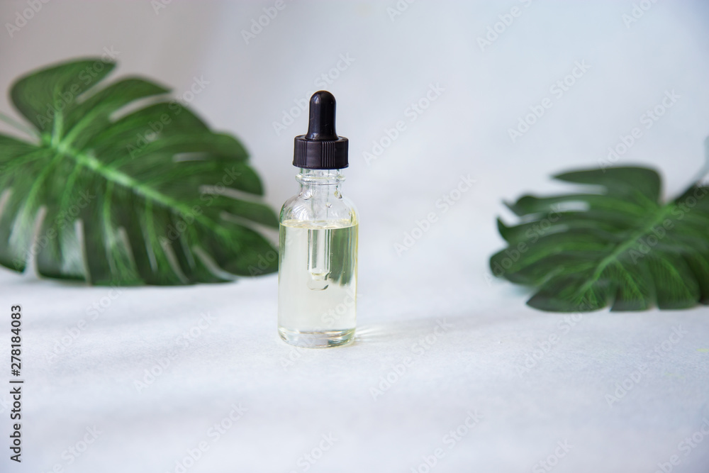 Dropper glass bottle with pipette. Mock up Essential liquid Dropper glass bottle with pipette. Mock up Essential liquid