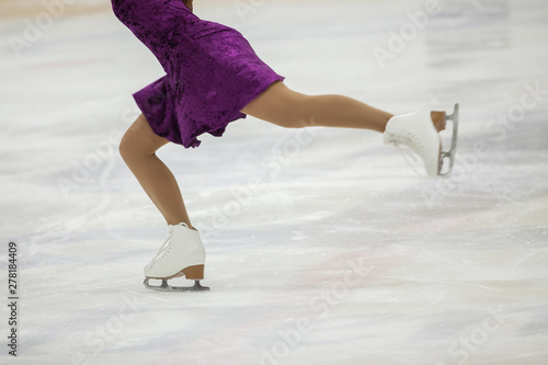 Canvas Print Figure skating, ice skating training. Feet skater on the ice