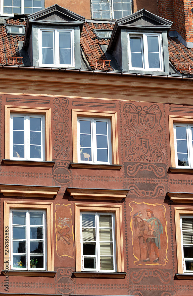 Ornately decorated burgher houses in Warsaw Old Town, Poland