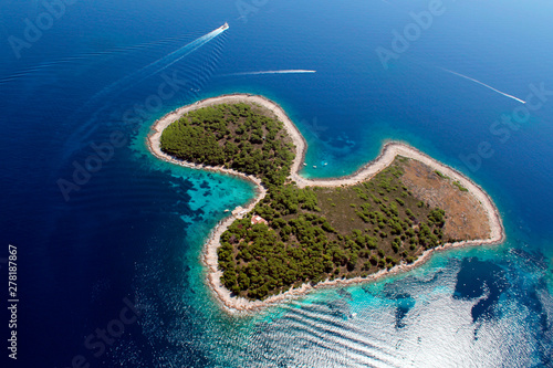 Island Jerolim is a Croatian island in the Adriatic Sea, one of the Paklinski Islands southwest of Hvar. Shot from air. photo