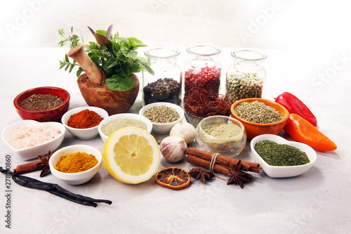 Spices and herbs on table. Food and cuisine ingredients with basil