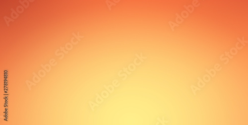 Orange gradient background with spotlight shine on center and vignette border. Presentation website template. photo