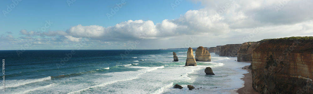 panoramic views of wild winter waves crashing against iconic Australian sandstone rock formations, the twelve apostles, great ocean road, Southern Victorian Coast