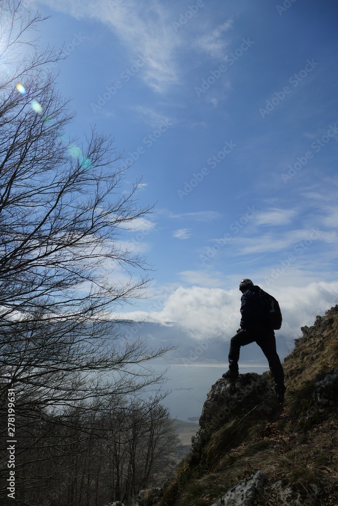 hiker on mountain peak in matese park