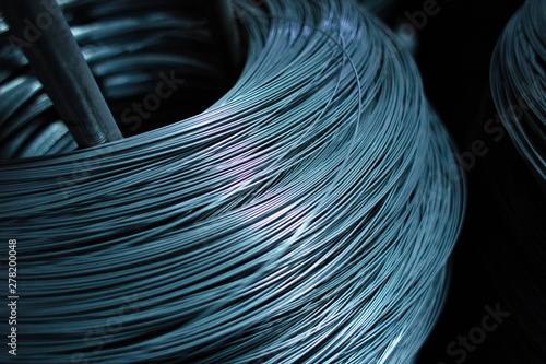 Close up wire coil metal material texture for industrial background