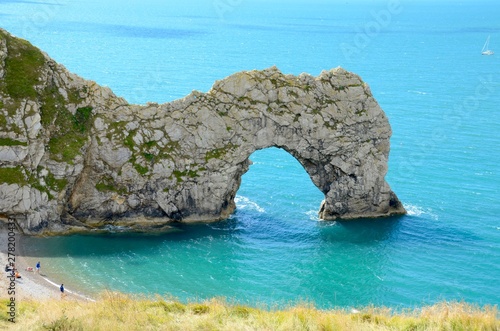 Durdle Door is a natural limestone arch on the Jurassic Coast in Dorset, England