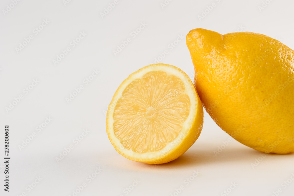 Lemon with water drops on white background. Citrus fruit. Healthy freshness food. fruit with vitamin Lemon with water drops on white background. Citrus fruit. Healthy freshness food. fruit with vitamin
