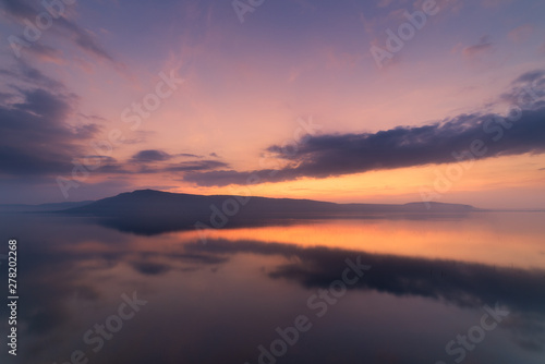 Landscape, sky, sea, clouds, mountains, sunrise time. Concepts, tourism and outdoor nature