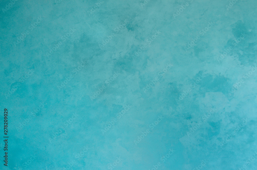 Decorative plaster with the effect of wet silk. Delicate turquoise texture. Hand made. Abstract background . Decorative plaster with the effect of wet silk. Delicate turquoise texture. Hand made. Abstract background .