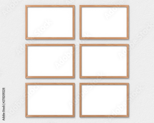 Set of 6 horizontal wooden frames mockup hanging on the wall. Empty base for picture or text. 3D rendering.