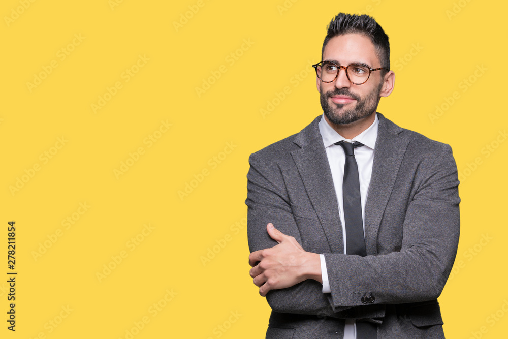 Young handsome business man over isolated background smiling looking side and staring away thinking. Young handsome business man over isolated background smiling looking side and staring away thinking.