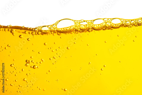 Oil car motor gasoline liquid yellow cemical with bubble isolated on white background