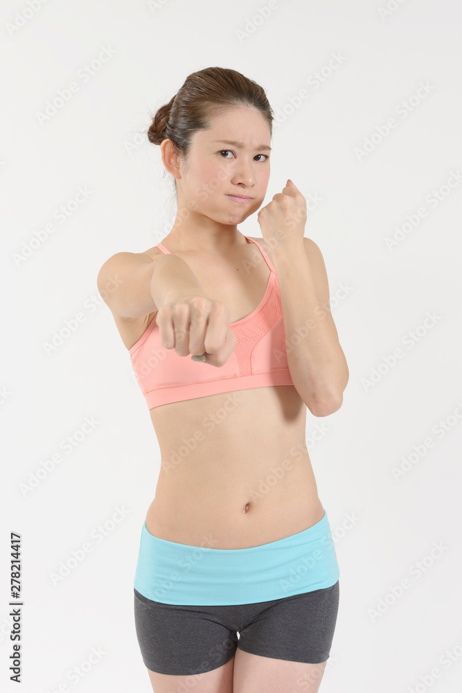 Obraz premium パンチする女性