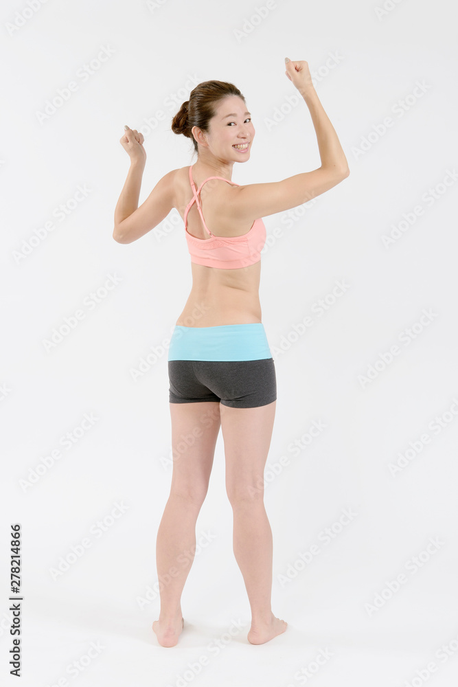 ガッツポーズする女性 ガッツポーズする女性