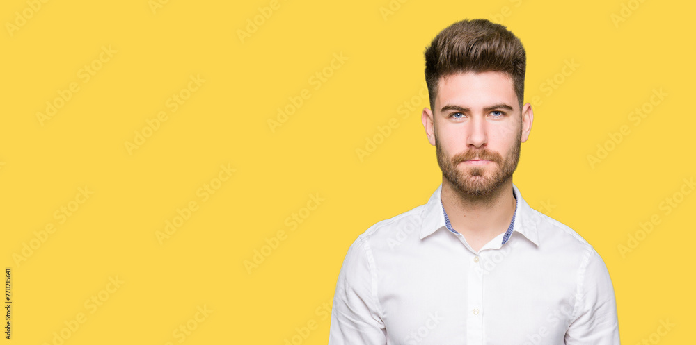 Young handsome business man skeptic and nervous, frowning upset because of problem. Negative person. Young handsome business man skeptic and nervous, frowning upset because of problem. Negative person.