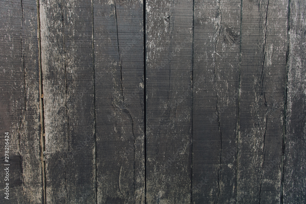 Naklejka premium Old wood texture background, with paint coming off.
