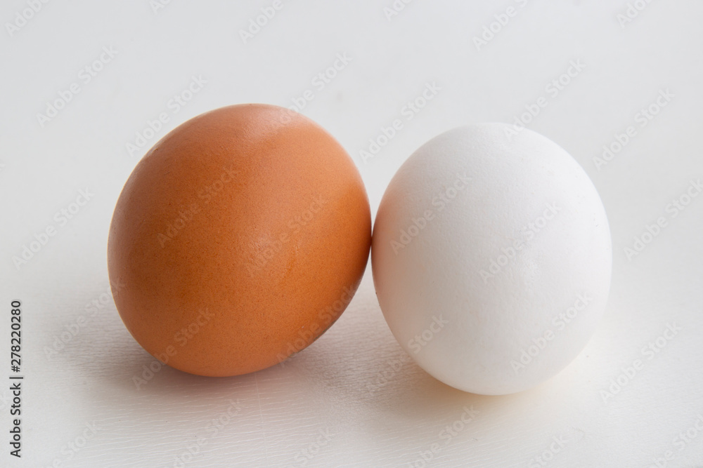 Chicken eggs for cooking. White and brown eggs. Chicken eggs for cooking. White and brown eggs.