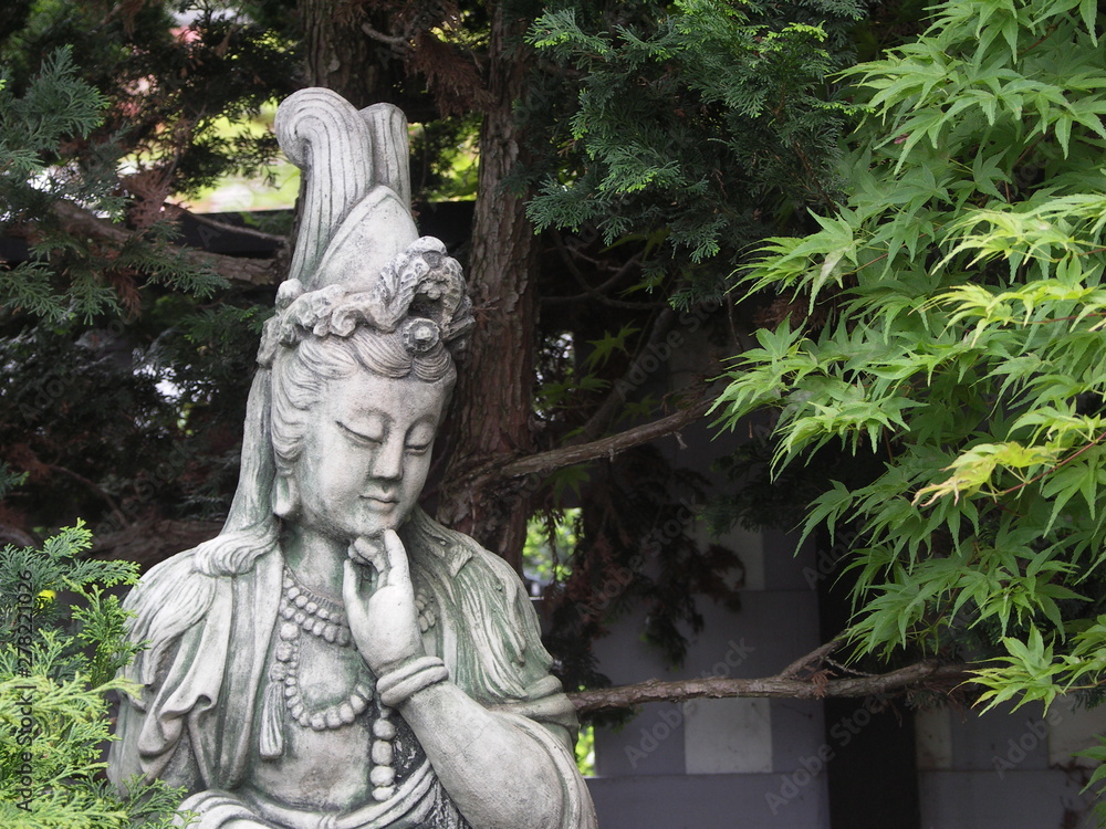 Quan Yin sculpture in garden