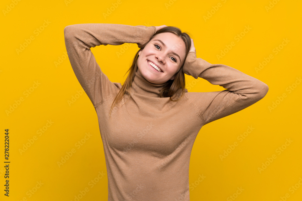 Young woman over colorful background laughing Young woman over colorful background laughing
