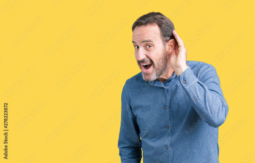 Handsome middle age elegant senior man over isolated background smiling with hand over ear listening an hearing to rumor or gossip. Deafness concept. Handsome middle age elegant senior man over isolated background smiling with hand over ear listening an hearing to rumor or gossip. Deafness concept.